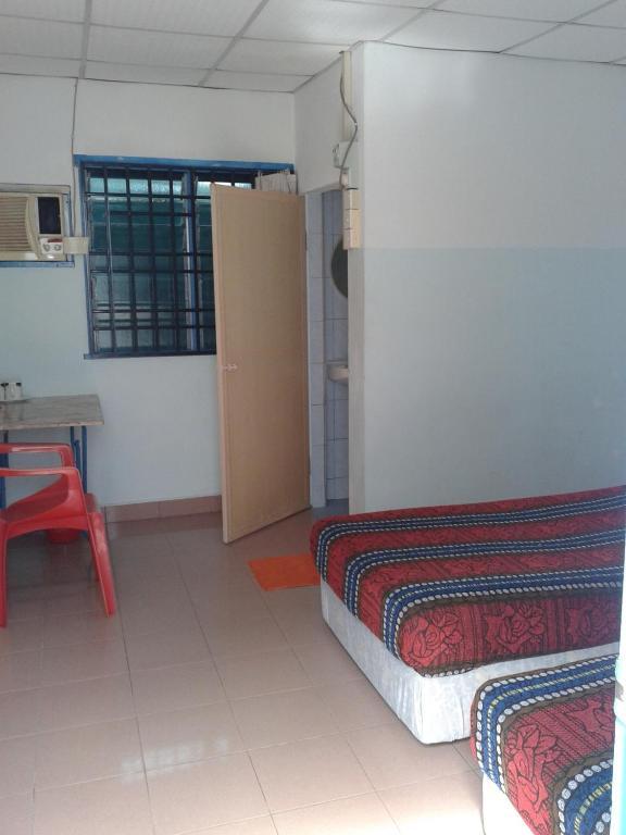 Et Budget Guest House Batu Ferringhi Room photo